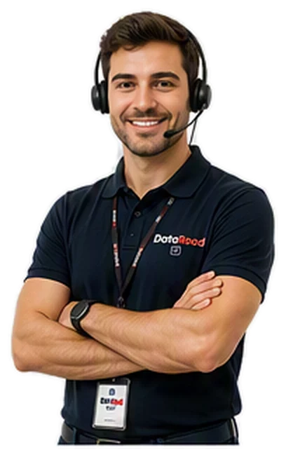 Smiling support agent wearing a headset, company polo, and lanyard with badge, arms crossed.